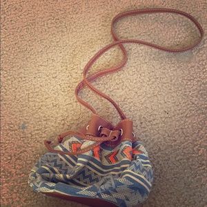 A boho looking crossbody purse